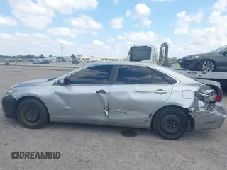 2015 Toyota Camry XLE with VIN 4T1BF1FK0FU093475, listed as a IAAI auction lot 42061877 with 131,618 mi miles. Bid and sale history available at carsss.com. Image 14.