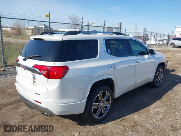 2019 GMC Acadia Denali with VIN 1GKKNXLSXKZ173883, listed as a IAAI auction lot 41863843 with 85,067 mi miles and . Bid and sale history available at carsss.com. Image 4.