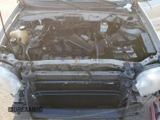 2005 Ford Escape Limited with VIN 1FMYU94195KB35872, listed as a Copart auction lot 63285755 with 145,638 mi miles and Salvage title. Bid and sale history available at DreamBid. Image 12.