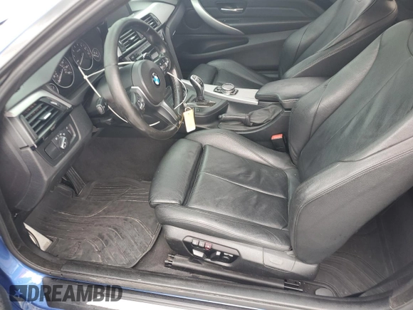 2014 BMW 4 Series 435i xDrive with VIN WBA3R5C50EK187272, listed as a Copart auction lot 56579855 with 129,873 mi miles and Salvage title. Bid and sale history available at DreamBid. Image 7.