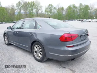 2016 Volkswagen Passat 1.8T S with VIN 1VWAT7A39GC032948, listed as a IAAI auction lot 42127599 with 177,407 mi miles. Bid and sale history available at carsss.com. Image 6.