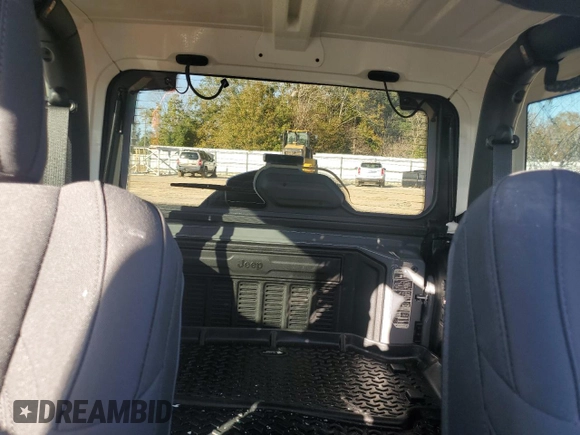 2020 Jeep Wrangler Willys with VIN 1C4GJXAG5LW307083, listed as a Copart auction lot 86994744 with 28,873 mi miles and Salvage title. Bid and sale history available at DreamBid. Image 10.