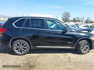 2017 BMW X5 sDrive35i with VIN 5UXKR2C5XH0U17833, listed as a IAAI auction lot 41856074 with 115,666 mi miles. Bid and sale history available at carsss.com. Image 14.