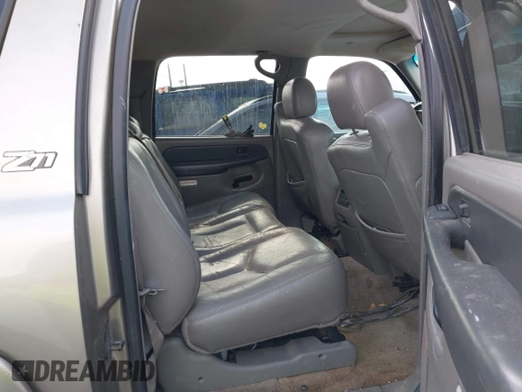 2003 Chevrolet Suburban Z71 with VIN 3GNFK16Z43G112291, listed as a IAAI auction lot 42148059 with Not Provided miles. Bid and sale history available at carsss.com. Image 8.