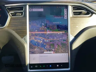 2015 Tesla Model S 85D with VIN 5YJSA1E28FF110066, listed as a IAAI auction lot 40672973 with 100,157 mi miles. Bid and sale history available at carsss.com. Image 19.
