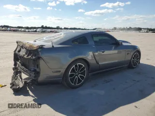2013 Ford Mustang GT with VIN 1ZVBP8CF5D5240282, listed as a Copart auction lot 58381595 with 56,915 mi miles and Clean title. Bid and sale history available at DreamBid. Image 3.