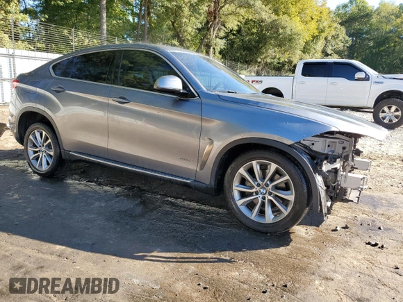 2015 BMW X6 sDrive35i with VIN 5UXKU0C57F0F91930, listed as a Copart auction lot 75622864 with 145,516 mi miles and Salvage Title. Bid and sale history available at carsss.com. Image 4.