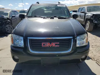 2005 GMC Envoy SLE with VIN 1GKDT13S752390266, listed as a Copart auction lot 50766935 with 115,225 mi miles and Salvage Title. Bid and sale history available at carsss.com. Image 5.