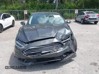 2018 Ford Fusion Titanium with VIN 3FA6P0D9XJR169657, listed as a IAAI auction lot 42392112 with 62,754 mi miles and . Bid and sale history available at DreamBid. Image 13.