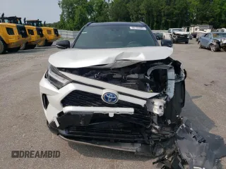 2023 Toyota RAV4 Hybrid XSE with VIN JTME6RFV5PJ034726, listed as a Copart auction lot 59105585 with 35,528 mi miles and Salvage title. Bid and sale history available at DreamBid. Image 5.