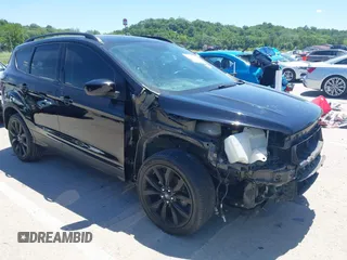 2017 Ford Escape SE z VIN 1FMCU0GD5HUD07772, wystawiony jako IAAI lot #42279764 z przebiegiem 88 661 mil mil oraz . Historia ofert i sprzedaży dostępna na DreamBid. Obrazek 1.