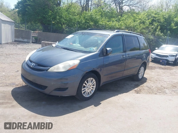 2008 Toyota Sienna XLE with VIN 5TDBK22C38S010150, listed as a IAAI auction lot 42070786 with 185,778 mi miles and . Bid and sale history available at DreamBid. Image 2.