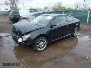 2005 Scion tC with VIN JTKDE177250016664, listed as a IAAI auction lot 41999552 with 122,557 mi miles. Bid and sale history available at carsss.com. Image 2.