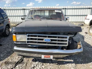 1989 Ford F-150 with VIN 1FTEX15N0KKB51052, listed as a Copart auction lot 70142074 with 74,351 mi miles and Salvage Title. Bid and sale history available at carsss.com. Image 5.