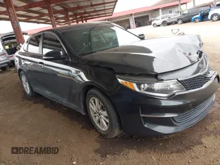 2016 Kia Optima LX with VIN KNAGT4L32G5111503, listed as a IAAI auction lot 42011975 with 114,476 mi miles. Bid and sale history available at carsss.com. Image 1.
