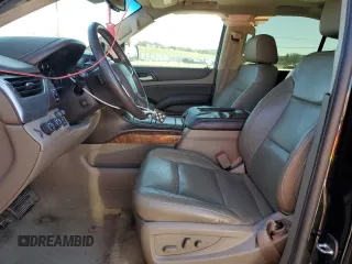 2015 Chevrolet Suburban LTZ with VIN 1GNSKKKC2FR634654, listed as a Copart auction lot 50337415 with 150,255 mi miles and Salvage Title. Bid and sale history available at DreamBid. Image 7.