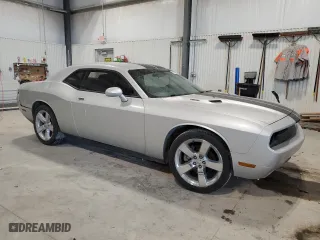 2010 Dodge Challenger R/T with VIN 2B3CJ5DT4AH323431, listed as a Copart auction lot 51140005 with 65,925 mi miles and Salvage Title. Bid and sale history available at carsss.com. Image 4.