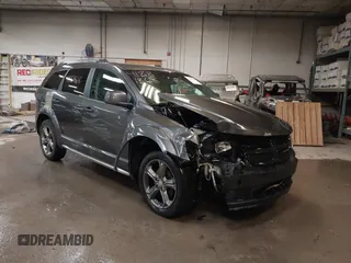 2015 Dodge Journey Crossroad with VIN 3C4PDDGG0FT607072, listed as a IAAI auction lot 41881868 with 185,699 mi miles. Bid and sale history available at carsss.com. Image 1.