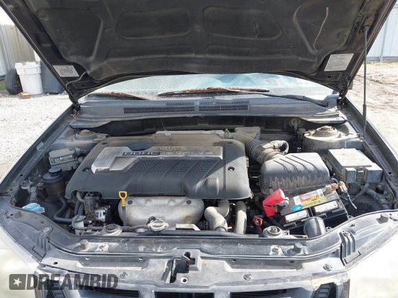 2005 Kia Spectra with VIN KNAFE161555093364, listed as a IAAI auction lot 41465930 with 190,769 mi miles. Bid and sale history available at carsss.com. Image 10.