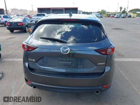 2021 Mazda CX-5 Touring with VIN JM3KFACM2M1348305, listed as a IAAI auction lot 41627199 with 30,044 mi miles. Bid and sale history available at carsss.com. Image 17.