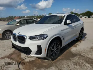 2022 BMW X4 xDrive30i with VIN 5UX33DT03N9J86660, listed as a Copart auction lot 49048433 with 13,694 mi miles. Bid and sale history available at carsss.com. Image 1.