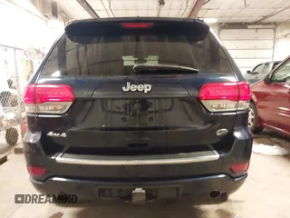 2017 Jeep Grand Cherokee Overland with VIN 1C4RJFCG3HC693897, listed as a IAAI auction lot 41636323 with 105,575 mi miles. Bid and sale history available at carsss.com. Image 17.