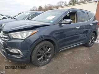 2017 Hyundai Santa Fe Ultimate with VIN 5NMZWDLA0HH045078, listed as a IAAI auction lot 41268809 with 100,659 mi miles and . Bid and sale history available at DreamBid. Image 14.