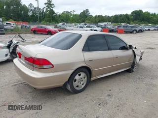2001 Honda Accord EX z VIN 1HGCG16561A080094, wystawiony jako IAAI lot #42230752 z przebiegiem 246 469 mil mil oraz . Historia ofert i sprzedaży dostępna na DreamBid. Obrazek 4.