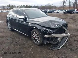 2021 Audi SQ5 Premium Plus z VIN WA1B4AFY0M2034427, wystawiony jako IAAI lot #41732315 z przebiegiem 26 419 mil mil oraz . Historia ofert i sprzedaży dostępna na DreamBid. Obrazek 1.