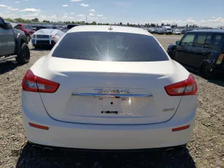 2016 Maserati Ghibli z VIN ZAM57XSA8G1166993, wystawiony jako Copart lot #51677735 z przebiegiem 58 215 mil mil oraz Tytuł czysty. Historia ofert i sprzedaży dostępna na DreamBid. Obrazek 6.