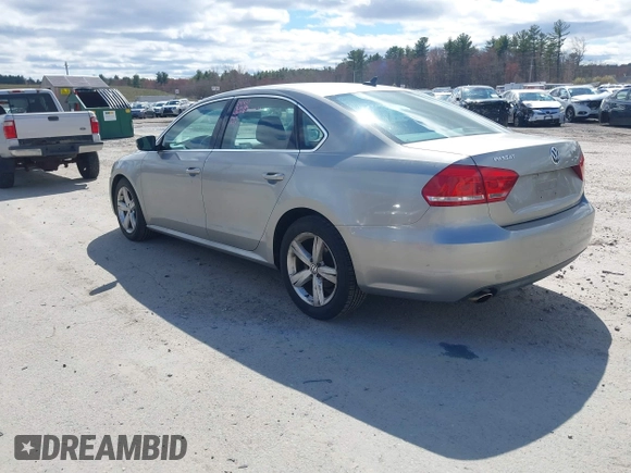 2013 Volkswagen Passat SE w/Sunroof & Nav with VIN 1VWBP7A37DC125598, listed as a IAAI auction lot 42022573 with 149,812 mi miles. Bid and sale history available at carsss.com. Image 3.