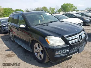2010 Mercedes-Benz GL-Class GL 450 with VIN 4JGBF7BEXAA540228, listed as a IAAI auction lot 42022843 with 168,621 mi miles. Bid and sale history available at carsss.com. Image 1.