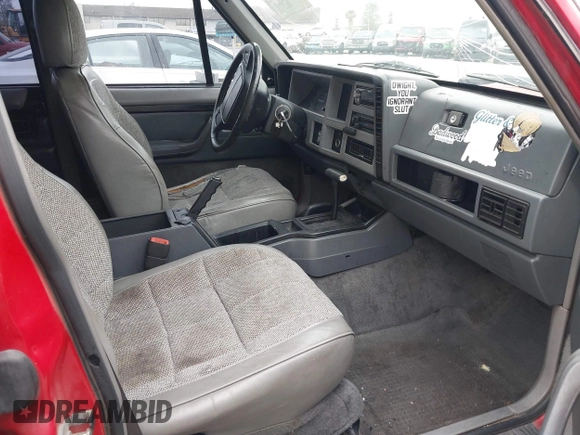 1996 Jeep Cherokee Country with VIN 1J4FJ78S3TL116814, listed as a IAAI auction lot 42131760 with 209,510 mi miles and . Bid and sale history available at DreamBid. Image 5.