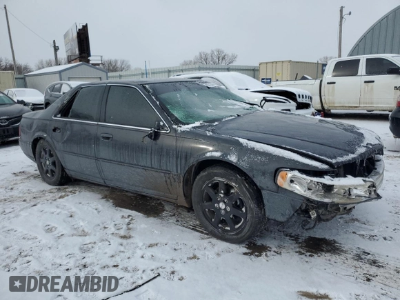 2002 Cadillac Seville Touring STS z VIN 1G6KY549X2U177791, wystawiony jako Copart lot #89313345 z przebiegiem 171 707 mil mil oraz Szkoda całkowita • Salvage title. Historia ofert i sprzedaży dostępna na DreamBid. Obrazek 4.