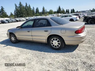 1999 Buick Regal LS with VIN 2G4WB52K8X1624610, listed as a Copart auction lot 64716284 with 106,902 mi miles and Salvage Title. Bid and sale history available at carsss.com. Image 2.