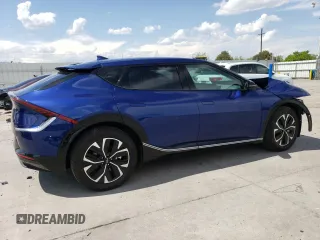 2024 Kia EV6 Wind z VIN KNDC3DLC0R5209580, wystawiony jako Copart lot #56254245 z przebiegiem 3 935 mil mil oraz Szkoda całkowita • Salvage title. Historia ofert i sprzedaży dostępna na DreamBid. Obrazek 3.