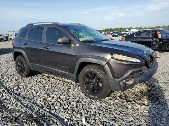 2016 Jeep Cherokee Trailhawk with VIN 1C4PJMBS4GW188840, listed as a Copart auction lot 58760605 with 117,570 mi miles and Salvage title. Bid and sale history available at DreamBid. Image 4.