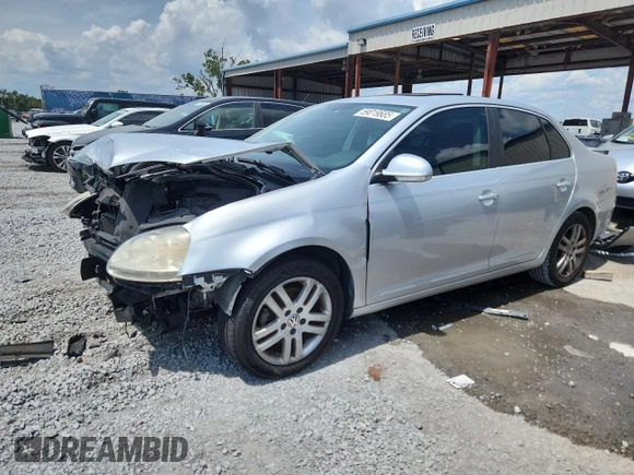 2007 Volkswagen Jetta Wolfsburg Edition z VIN 3VWEF71K57M189021, wystawiony jako Copart lot #59019685 z przebiegiem 124 720 mil mil oraz Szkoda całkowita • Salvage title. Historia ofert i sprzedaży dostępna na DreamBid. Obrazek 1.