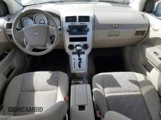 2007 Dodge Caliber SXT with VIN 1B3HB48B27D263783, listed as a Copart auction lot 53116575 with 164,533 mi miles and Salvage Title. Bid and sale history available at DreamBid. Image 8.