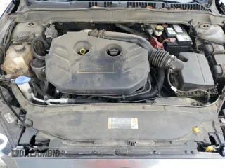 2016 Ford Fusion Titanium with VIN 3FA6P0K90GR180288, listed as a Copart auction lot 60218155 with 140,502 mi miles and Salvage title. Bid and sale history available at DreamBid. Image 11.