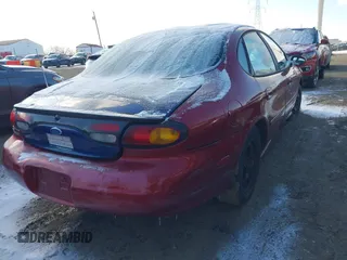 1997 Ford Taurus LX with VIN 1FALP53S0VG308339, listed as a IAAI auction lot 41630596 with 171,871 mi miles and . Bid and sale history available at DreamBid. Image 4.