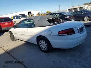 2004 Chrysler Sebring LX with VIN 1C3EL45X74N327583, listed as a Copart auction lot 82833194 with 114,804 mi miles and Salvage Title. Bid and sale history available at DreamBid. Image 2.
