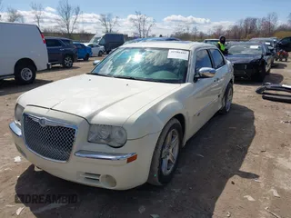 2008 Chrysler 300 C Hemi with VIN 2C3KA63H18H335807, listed as a IAAI auction lot 41986105 with 149,837 mi miles and . Bid and sale history available at carsss.com. Image 2.