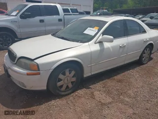 2002 Lincoln LS w/Base Pkg with VIN 1LNHM87A22Y703264, listed as a IAAI auction lot 42004825 with 1 mi miles. Bid and sale history available at carsss.com. Image 2.