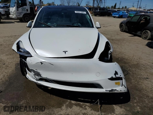 2022 Tesla Model Y Long Range z VIN 7SAYGDEEXNF455766, wystawiony jako Copart lot #49641685 z przebiegiem 51 142 mil mil oraz Szkoda całkowita • Salvage title. Historia ofert i sprzedaży dostępna na DreamBid. Obrazek 5.