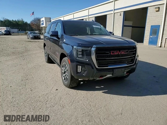 2021 GMC Yukon AT4 with VIN 1GKS2CKD7MR418968, listed as a Copart auction lot 82445284 with 73,660 mi miles and Salvage Title. Bid and sale history available at carsss.com. Image 12.