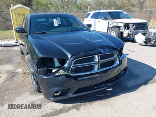 2013 Dodge Charger SE with VIN 2C3CDXBG5DH639694, listed as a IAAI auction lot 41134402 with 159,517 mi miles and . Bid and sale history available at DreamBid. Image 6.