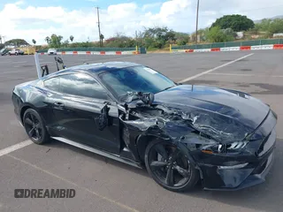2021 Ford Mustang GT z VIN 1FA6P8CF1M5147740, wystawiony jako IAAI lot #38920487 z przebiegiem 15 299 mil mil oraz . Historia ofert i sprzedaży dostępna na DreamBid. Obrazek 17.