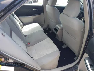 2014 Toyota Camry L with VIN 4T4BF1FKXER402857, listed as a IAAI auction lot 42144757 with 192,081 mi miles and . Bid and sale history available at DreamBid. Image 8.
