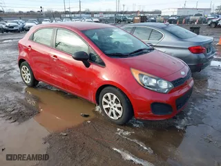 2013 Kia Rio LX with VIN KNADM5A39D6126644, listed as a IAAI auction lot 41606509 with 197,656 mi miles. Bid and sale history available at carsss.com. Image 1.